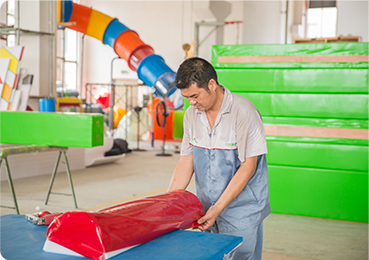 Picture Of Workers Installing Trampoline Park Accessories